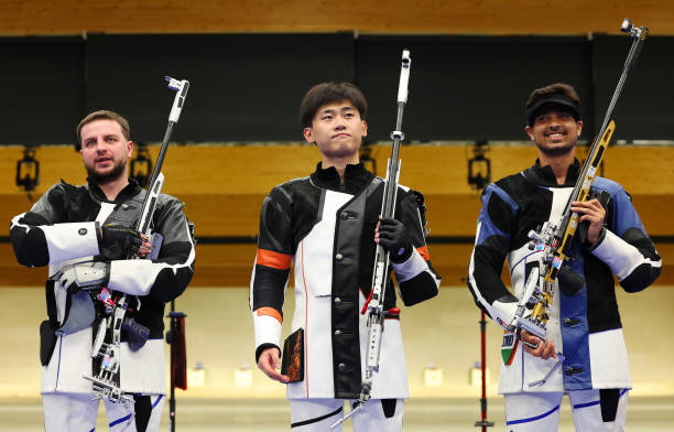 马龙与陈梦：2021年奥运乒乓球单打冠军的辉煌时刻