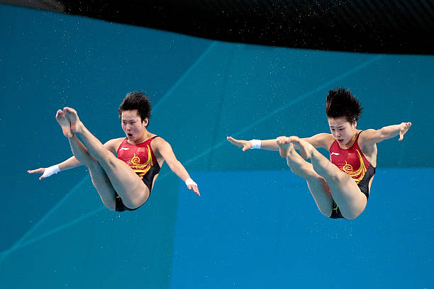 吴敏霞奥运领奖台照片对比,四届奥运金牌的辉煌历程