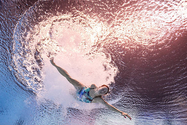 伏明霞丈夫梁锦松的财富与事业版图