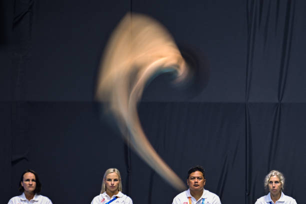 跳远瞬间的描写:从助跑到落地